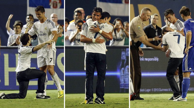 Cristiano Ronaldo hugs a fan