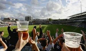 cricket fans with beer