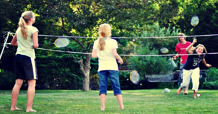 family playing badminton