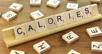This Is How Many Calories You Can Lose! A scrabble board showing the word calories.