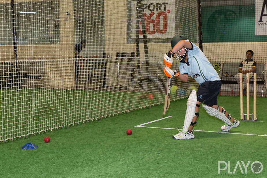 A man playing Cricket in Cover Drive Sports Academy