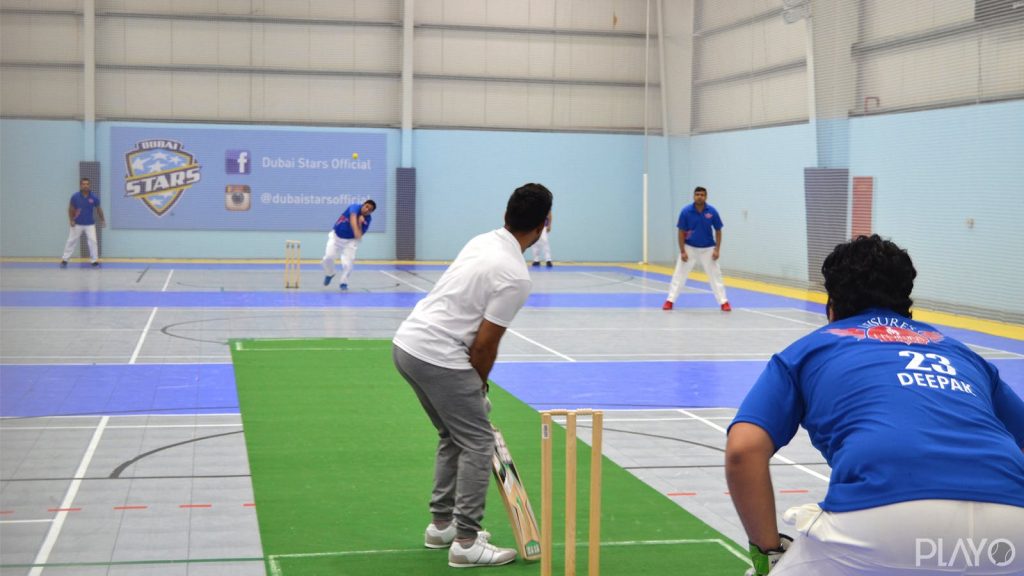 A man playing cricket in Dubai Stars