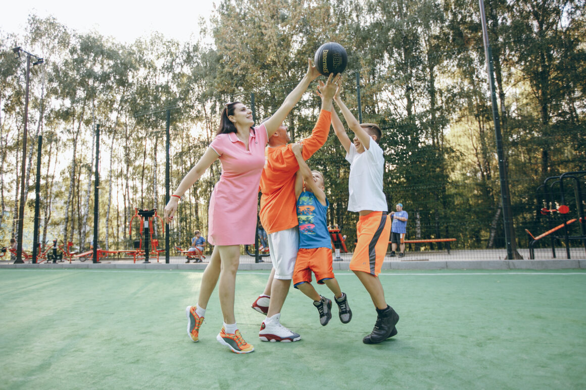 A family enjoying quality time while playing sport